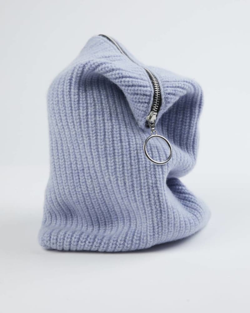Front of a model wearing a size O/S Slouchy Hold-To Clutch in Pale Lavender in Pale Lavender by AMBER HARDS. | dia_product_style_image_id:342997